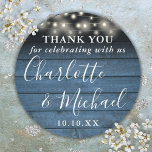 Blue Rustic String Lights Wedding Favour Thank You Classic Round Sticker<br><div class="desc">Rustic signature script wedding favour thank you classic round sticker featuring pretty string lights and signature style names on a blue wood panels background. Personalize with your special thank you information in chic white typography. Designed by Thisisnotme©</div>