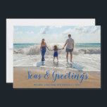 Blue Seas and Greetings  Beach Christmas Holiday Card<br><div class="desc">A clever take on the traditional holiday card features your favourite beach photo with Seas & Greetings in a modern tropical blue script . Personalize with your family name and the year.</div>