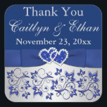 Blue, Silver Grey Floral Wedding Favour Sticker<br><div class="desc">This 1.5" square shaped royal blue and silver grey floral wedding favour thank you sticker has a PRINTED ribbon and bow with a pair of PRINTED diamond jewel and FAUX glitter (simulated) joined hearts on it that matches the wedding invitations shown below. It's a perfect way to send out a...</div>