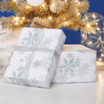 Blue Silver Grey Snowflake Wonderland Wrapping Paper<br><div class="desc">This wintry design features blue and silver-grey snowflakes on a white background! Perfect for all winter long during the holiday season.</div>