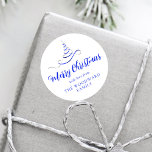 Blue Silver Ribbon Tree Merry Christmas Script Classic Round Sticker<br><div class="desc">This modern holiday sticker features a royal blue and silver faux foil ribbon Christmas tree sprinkled with silver faux glitter,  and the words "Merry Christmas" in stylish royal blue calligraphy script. Personalize it with your family's name in serif font.</div>