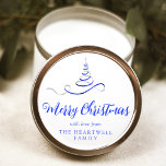 Blue Silver Ribbon Tree Merry Christmas Script Classic Round Sticker<br><div class="desc">This modern holiday sticker features a blue and silver faux foil ribbon Christmas tree sprinkled with silver faux glitter,  and the words "Merry Christmas" in stylish blue calligraphy script. Personalize it with your family's name in serif font.</div>