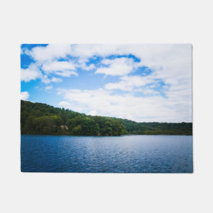 Blue Sky and Calm Waters in Spring Doormat