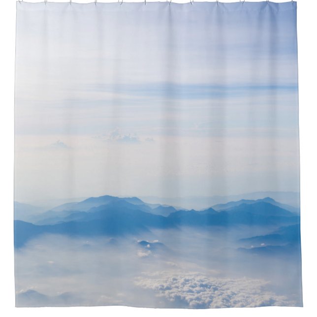 Blue sky and mountains view from airplane stylized (Front)