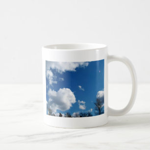 blue sky and white clouds coffee mug