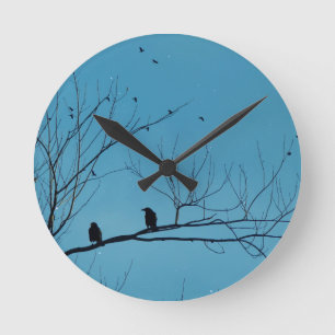 Blue Sky Crows Round Clock