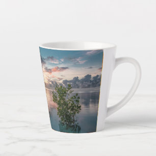 blue sky with red and dark clouds reflected on sea latte mug