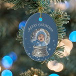 Blue Snowglobe Snowflake Photo Ceramic Ornament<br><div class="desc">Adorn your Christmas tree in style with this fully customizable ornament featuring a whimsical snow globe design. The ornament showcases your personal photo in the snow globe, allowing you to capture special memories with family, pets, or friends. The background is a festive blue with a sprinkle of adorable snowflakes, creating...</div>
