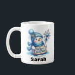 Blue Snowman Merry Christmas Sign Coffee Mug<br><div class="desc">Spread holiday cheer with this Personalized Blue Snowman Merry Christmas Sign Mug! This charming Christmas coffee mug features an adorable snowman dressed in a cozy blue hat and scarf, holding a festive 'Merry Christmas' sign and a sparkling snowflake wand. Easily customize it with any name to make it a perfect...</div>