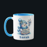 Blue Snowman Merry Christmas Sign Mug<br><div class="desc">Spread holiday cheer with this Personalized Blue Snowman Merry Christmas Sign Mug! This charming Christmas coffee mug features an adorable snowman dressed in a cozy blue hat and scarf, holding a festive 'Merry Christmas' sign and a sparkling snowflake wand. Easily customize it with any name to make it a perfect...</div>