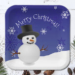 Blue Snowman Winter Scenery Christmas Paper Plate<br><div class="desc">Brighten your holiday party supplies with this Blue Snowman Winter Scenery Paper Plates, perfect for your Christmas party supply needs. These charming plates feature a winter scene with a snowman and top hat, accented by white snowflakes and falling snow. The holiday typography displaying "Merry Christmas" adds a joyful touch to...</div>
