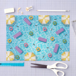 Blue Swimming Pool With Colorful Pool Floats Tissue Paper