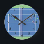 Blue Tennis Court Modern Tennis Player Round Clock<br><div class="desc">Personalized classic tennis court design in blue with classic, chic, preppy & elegant tennis rackets and green tennis balls. Simple, minimalist gift for your tennis coach or tennis team. Personalized Gift for a tennis player. Blue tennis court illustration. Trendy tennis players home decor. Trendy modern tennis player gifts. Cool retro...</div>