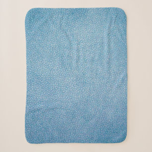 Blue textile sherpa blanket