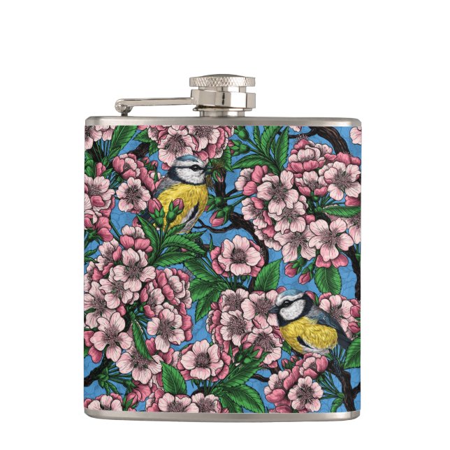 Blue tit birds in the blooming cherry tree on blue hip flask (Front)