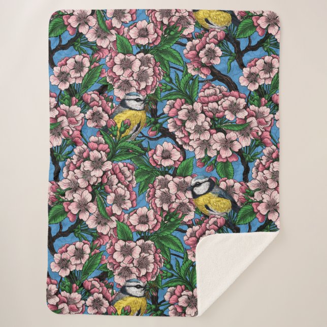 Blue tit birds in the blooming cherry tree on blue sherpa blanket (Front)