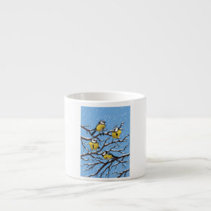 Blue tit birds in winter espresso cup