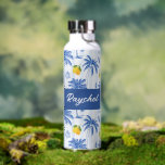 Blue Toile Palm Trees Lemons Monogram Name Water Bottle<br><div class="desc">Blue Toile Palm Trees Lemons Monogram Name Water Bottle. Bring a splash of tropical coastal charm to your daily routine with this lovely water bottle featuring a light blue striped background adorned with sketched blue palm trees and vibrant yellow lemons. Customizable white script lettering, for your name making it a...</div>