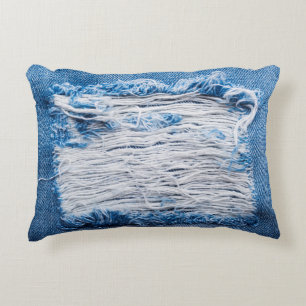 Blue torn denim jeans texture with space for text accent pillow