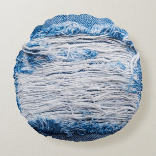 Blue torn denim jeans texture with space for text round pillow