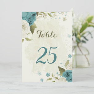 blue white flowers greenery table number card