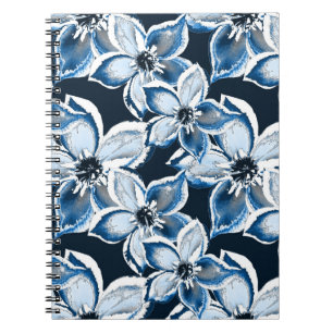 Blue, white flowers on a black background. Notebook