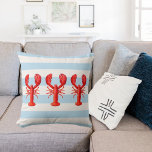 Blue white nautical stripes red lobsters throw pillow<br><div class="desc">Decorate your summer home or beach house with a classic nautical pillow. Light blue pastel and white colored horizontal stripes.  With three red lobsters as decor.</div>