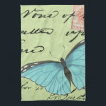 Blue-Winged Butterfly on Teal Postcard Kitchen Towel<br><div class="desc">This teal postcard carries a message of beauty. A delicate blue-winged butterfly rests on the card,  obscuring some of the script it contains. This Vision Studio print would make a great addition to your home!</div>