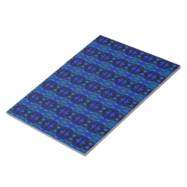 Blue with 'floating' intertwined strokes notepad (Angled)