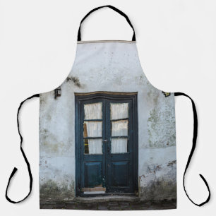 BLUE WOODEN DOOR PANEL IN WHITE BUILDING APRON