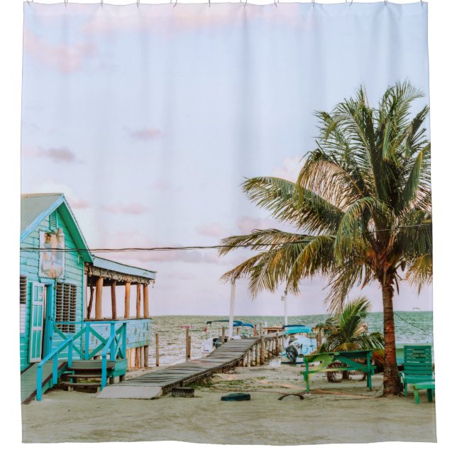 BLUE WOODEN HOUSE NEAR BODY OF WATER (Front)
