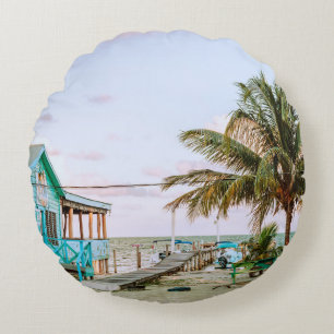 BLUE WOODEN HOUSE NEAR BODY OF WATER ROUND PILLOW