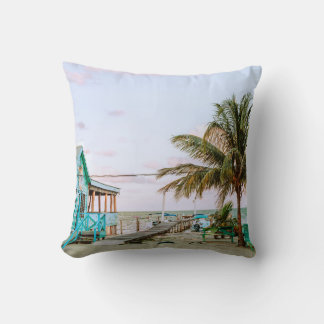 BLUE WOODEN HOUSE NEAR BODY OF WATER THROW PILLOW