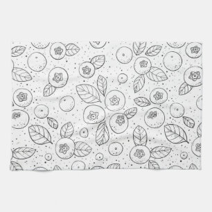 Blueberries on black and white kitchen towel