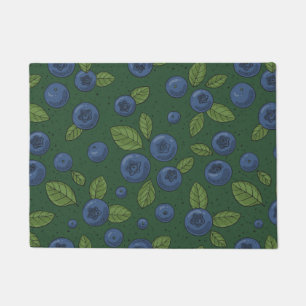 Blueberries on blue doormat