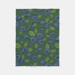 Blueberries on blue fleece blanket