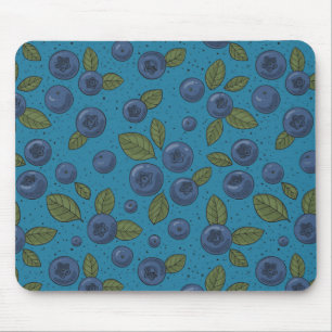 Blueberries on blue mouse pad