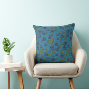 Blueberries on blue throw pillow