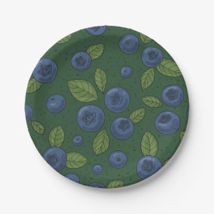 Blueberries on dark green paper plate