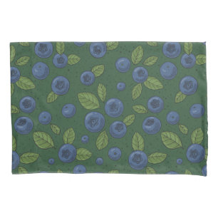 Blueberries on dark green pillowcase