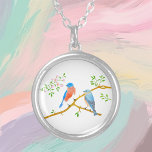 Bluebirds Round Necklace<br><div class="desc">Eastern bluebirds are only found in North America. While the female bird's colours are not as bright as the male's colours, both display fascinating blue and reddish-orange throat and breast with a white underside. The image and background can be customized. Text may be personalized or added. Original artwork by W.B....</div>