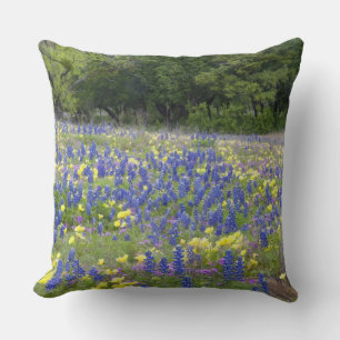 Bluebonnets, primrose, and phlox throw pillow