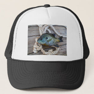 Bluegill fish on dock and rope trucker hat