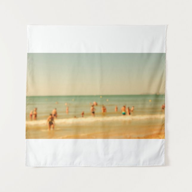 Blurred beach photo with bokeh. People relaxing on Tapestry (Front)