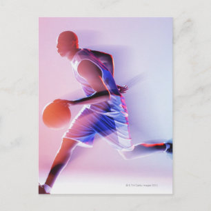 Blurred view of basketball player dribbling postcard