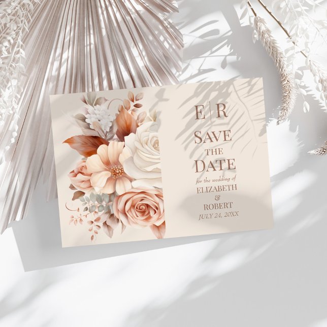 Blush Floral Monogram Save the Date Card (Mousse Monogram Floral Wedding Save the Date Card on a sunny white table with neutral boho flowers.)