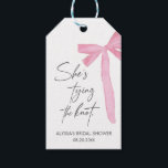 Blush Pink Bow She's Tying The Knot bridal Shower Gift Tags<br><div class="desc">Add a charming touch to your celebration with the Blush Pink Bow "She’s Tying the Knot" Bridal Shower Favour Tags! Featuring a chic bow design and customizable text,  these elegant tags are perfect for personalizing favours and thanking guests in style.</div>