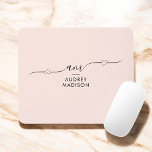 Blush Pink Girly Calligraphy Monogram Heart Mouse Pad<br><div class="desc">Add a touch of elegance to your workspace with this chic, girly mousepad! Featuring your monogram in delicate fancy calligraphy, adorned with a heart, and your name below in a sleek, modern sans serif font, this mousepad is as stylish as it is functional. With its blush pink colour, it's the...</div>