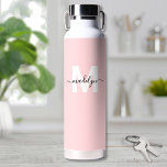 Blush Pink Modern Name Monogram Water Bottle<br><div class="desc">Create Your Own Personalized Blush Pink Name Monogram Water Bottle. This cute and stylish water bottle features a soft blush pink background with a bold white initial in the centre, overlaid by a flowing black script name for a personalized touch on both sides. Ideal for students, teachers, gym-goers, and fitness...</div>