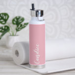 Blush Pink Personalized Wedding Bridesmaid Water Bottle<br><div class="desc">Gift your wedding bridesmaid or maid of honour with this trendy, vacuum Insulated water bottle that features her name in white, stylized script on a blush pink colour background designed to match your wedding colour scheme. Personalize bottle by editing and replacing name with your own as desired. Select your water...</div>